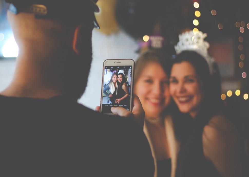 Free Image of Blurry friends on selfie in celebration 