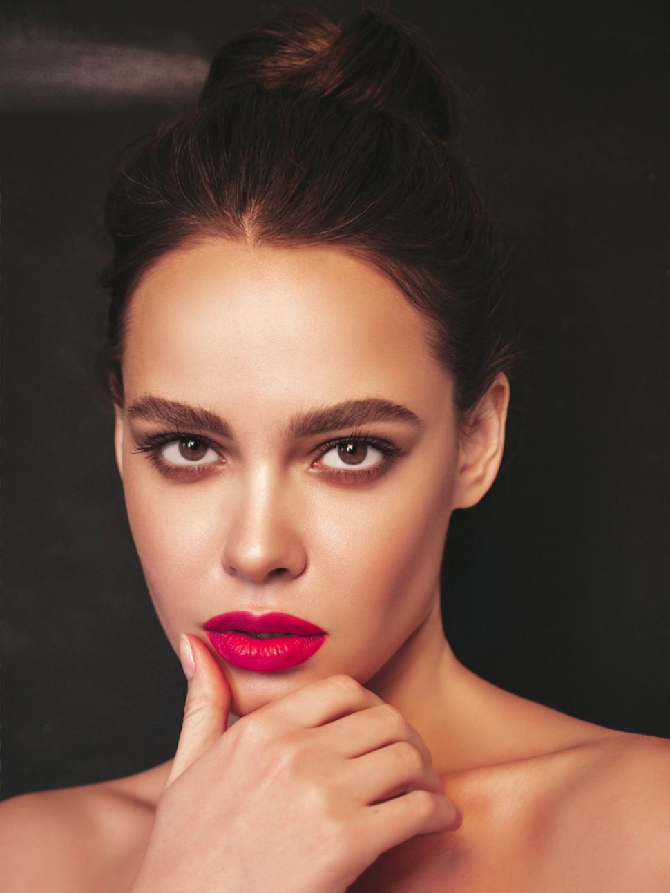 Free Image of A woman with red lipstick 