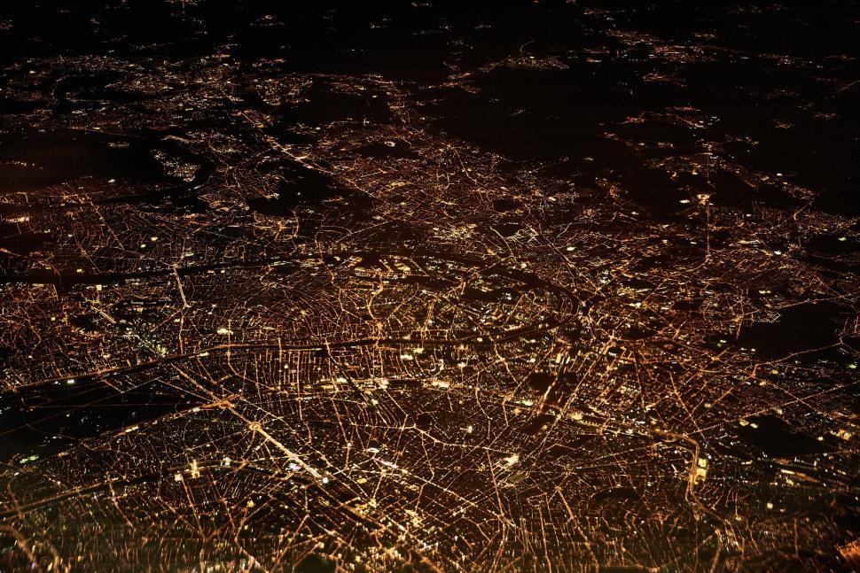 Free Image of City lights from above showcasing urban sprawl 