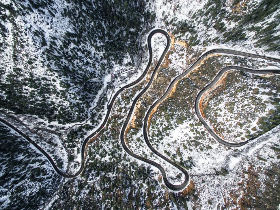 Free Image of Winding road in snowy mountain landscape 