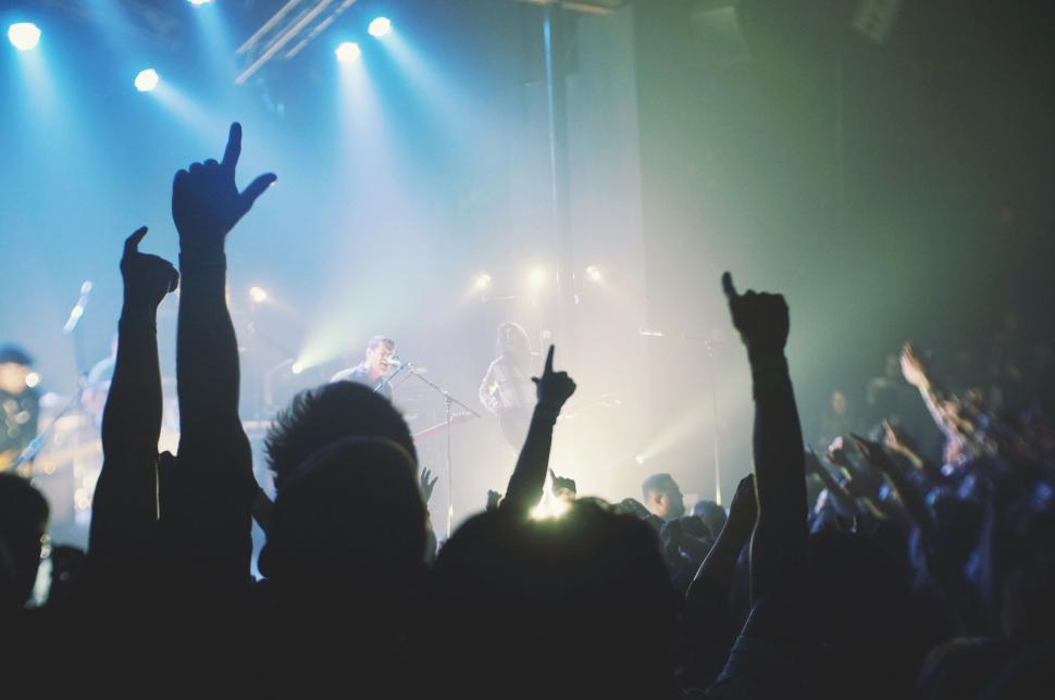 Free Image of Concert crowd with raised hands 