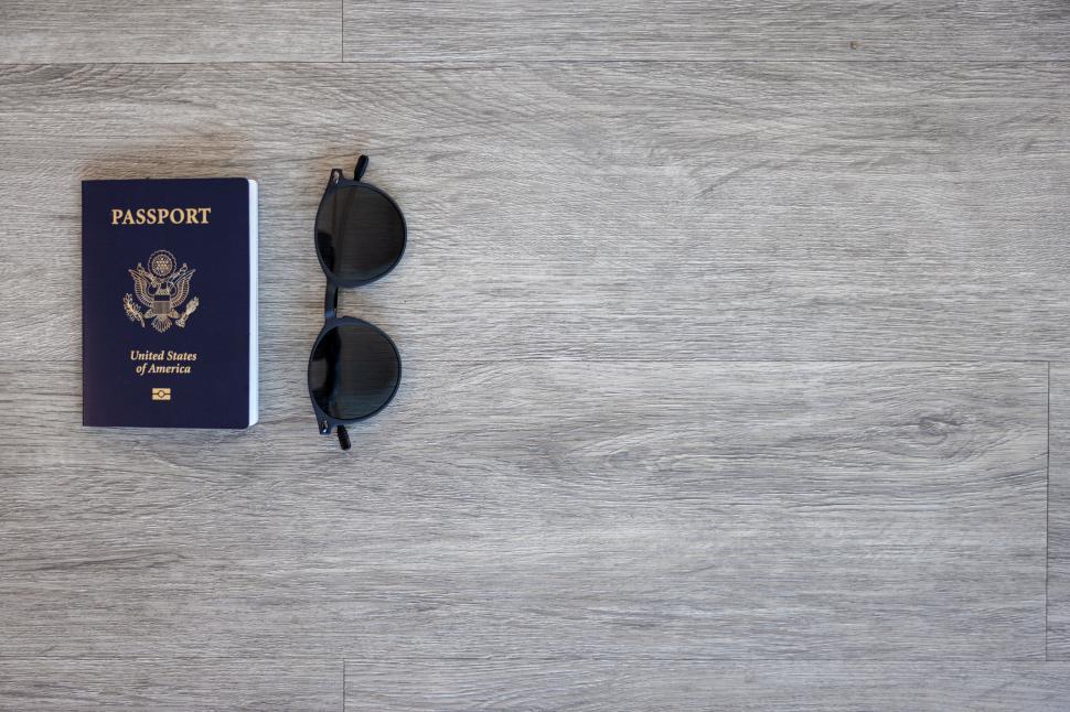 Free Image of Passport and sunglasses travel concept 