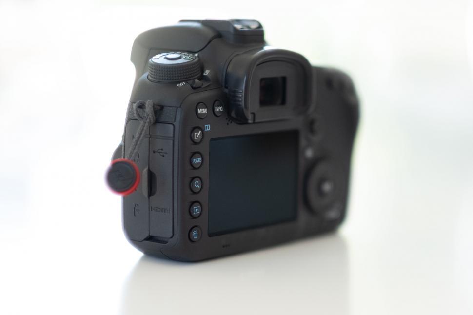 Free Image of Professional DSLR camera body on white 