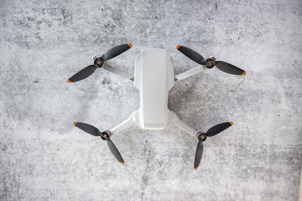 Free Image of Drone with spinning propellers from below 