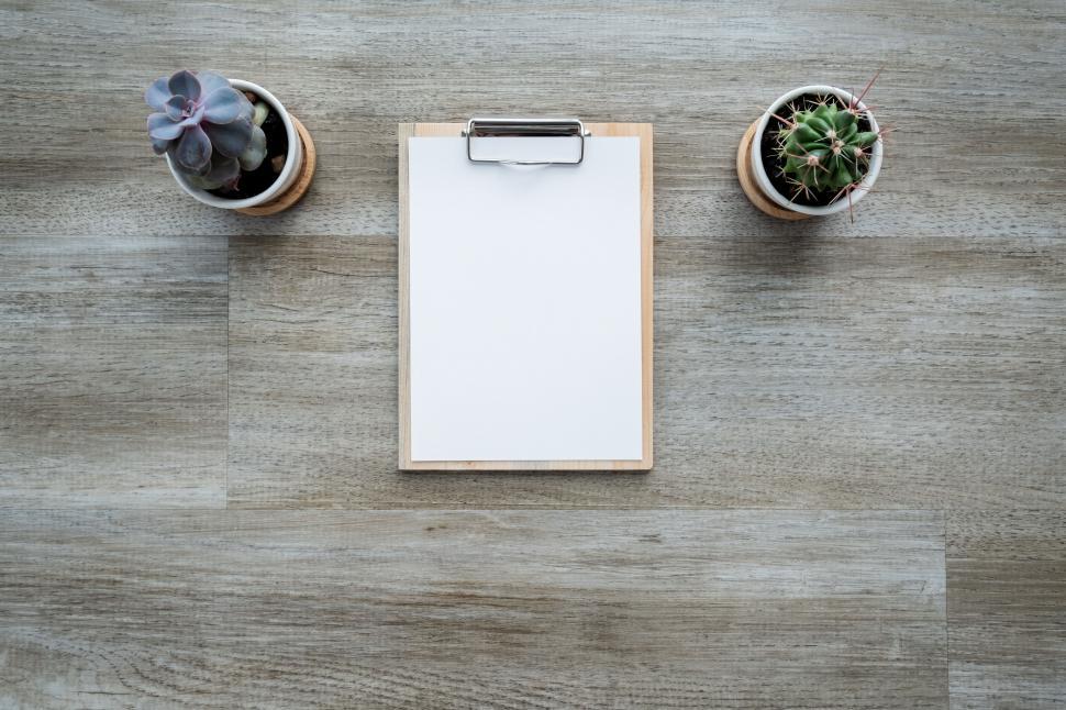 Free Image of Clipboard with blank paper on a desk 
