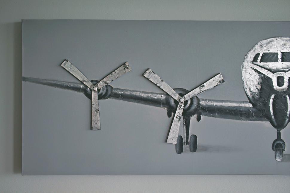 Free Image of Abstract airplane art on a wall 