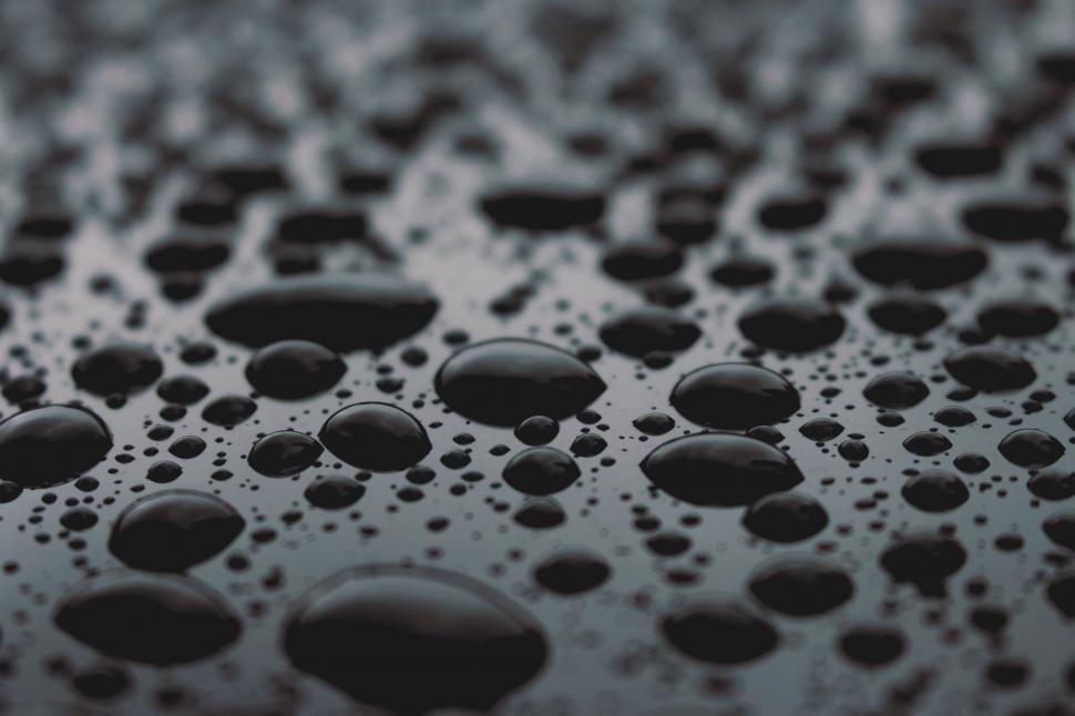 Free Image of Close-up of water droplets on a surface 