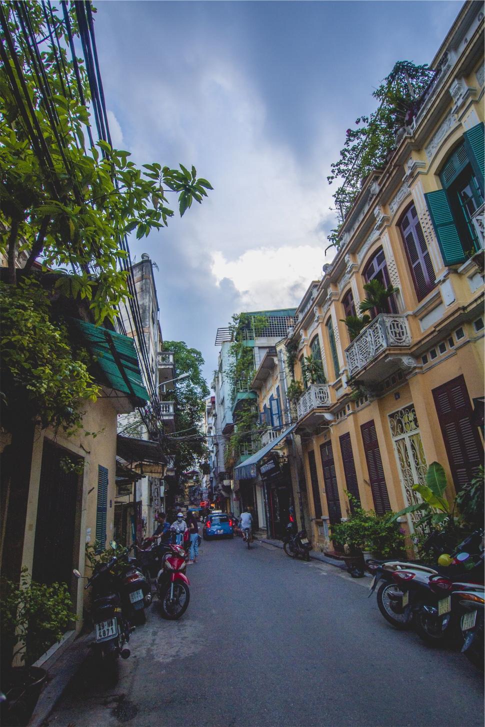 Free Image of Bustling narrow street in Vietnamese town 