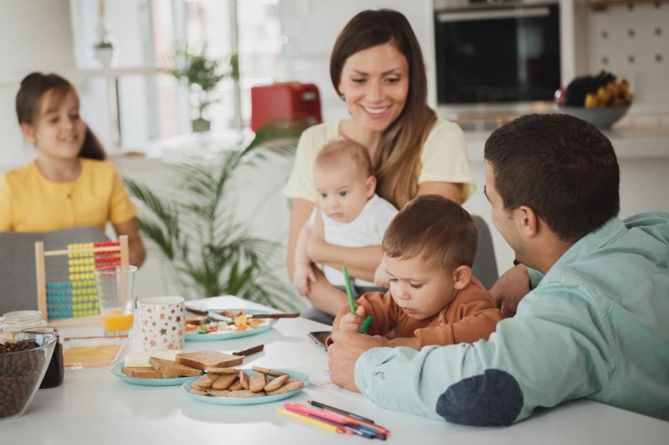 Free Image of Family enjoys breakfast together at home 