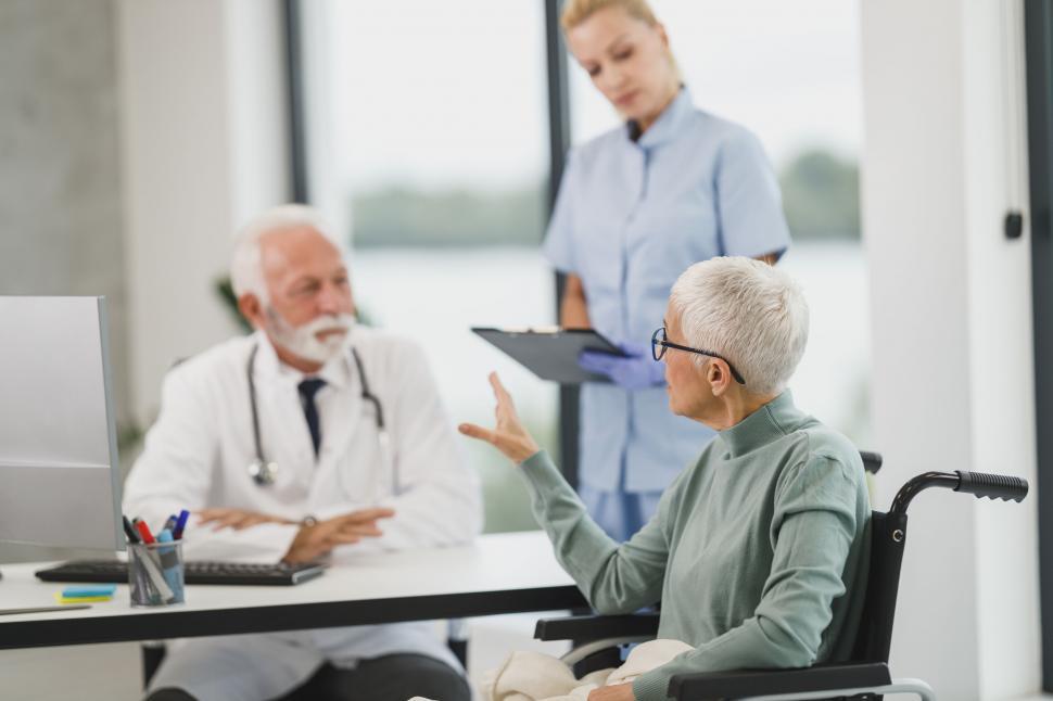 Free Image of Elderly patient consulting with a doctor 