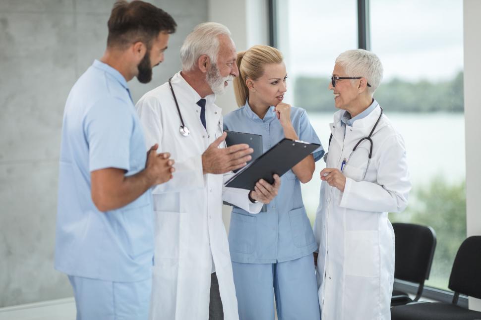 Free Image of Team of medical professionals discussing 