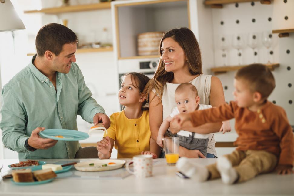 Free Image of Family sharing a meal together at home 