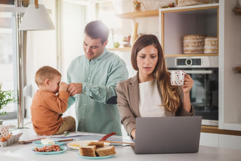 Free Image of Busy family moment with working mom 