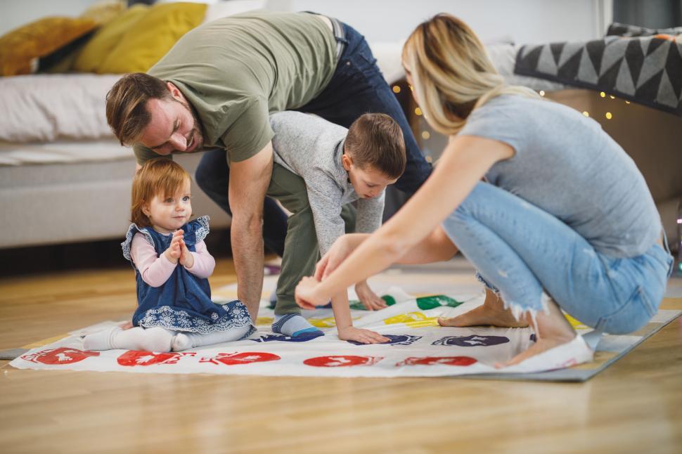 Free Image of Family engaging in playful painting 