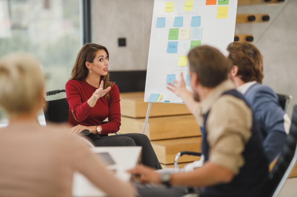 Free Image of Woman presenting ideas in creative workshop 