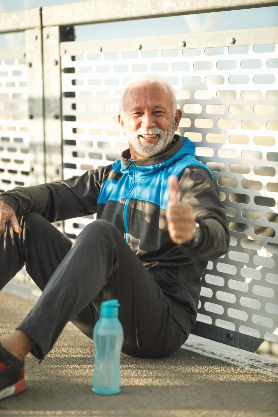 Free Image of Senior man giving thumbs up after exercise 