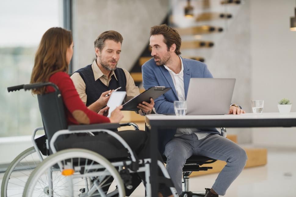 Free Image of Business meeting with a person in wheelchair 