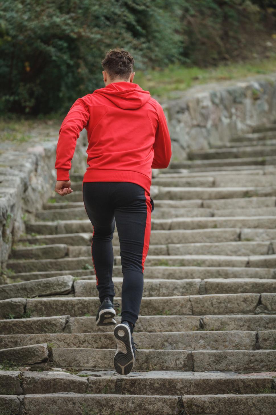 Free Image of Athlete ascending stairs during outdoor workout 