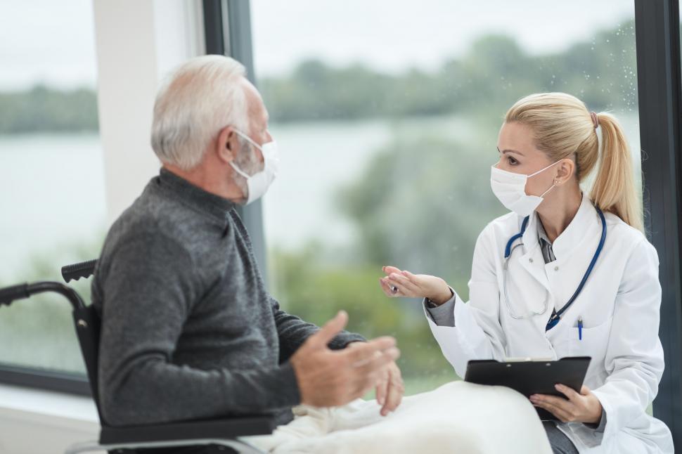 Free Image of Elderly patient discussing health with female doctor 