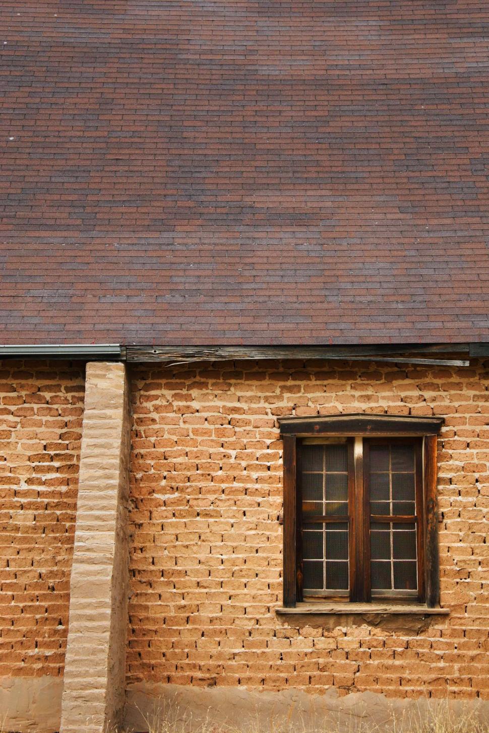 Free Image of Brick Wall With Wooden Window 