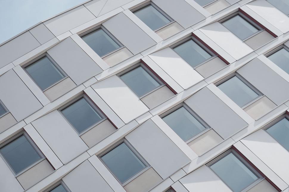 Free Image of Modern building facade with patterned windows 