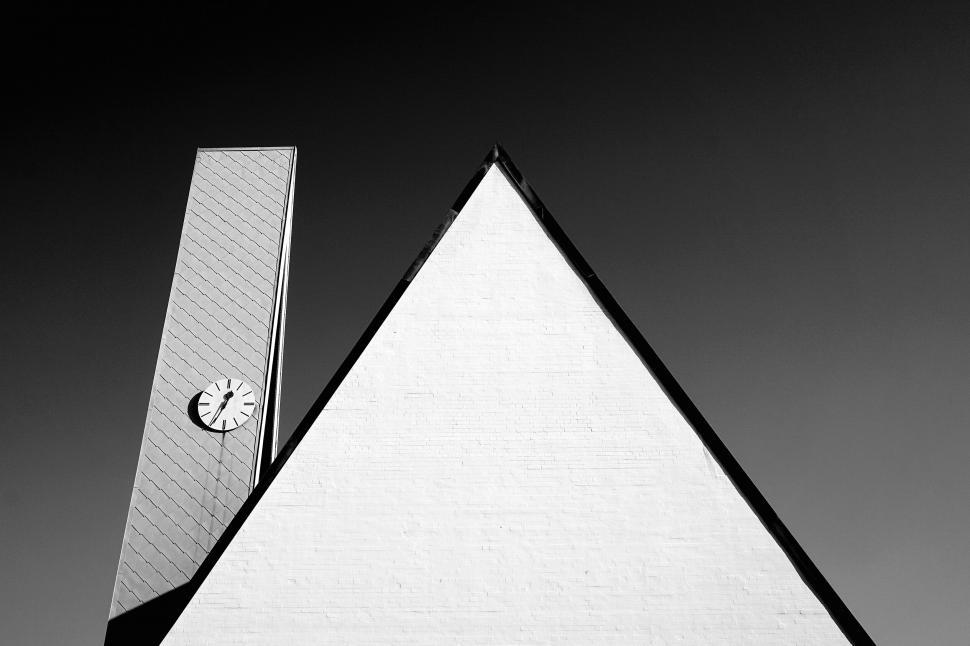Free Image of Monochrome image of a clock on a building 