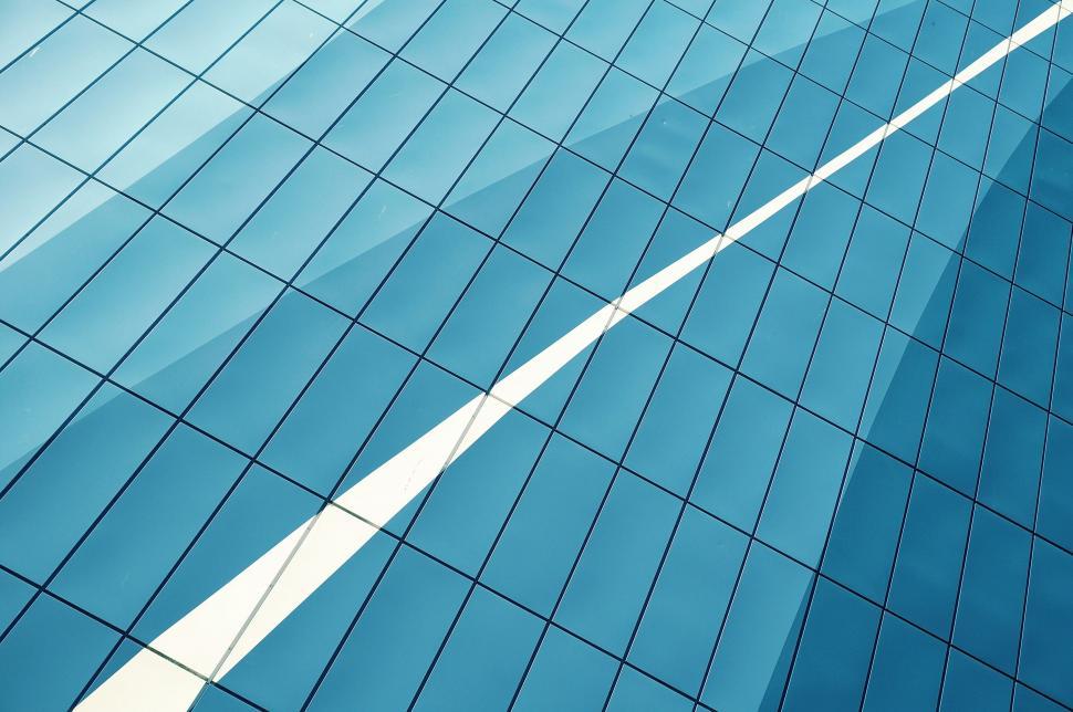 Free Image of Abstract reflection on blue glass building 