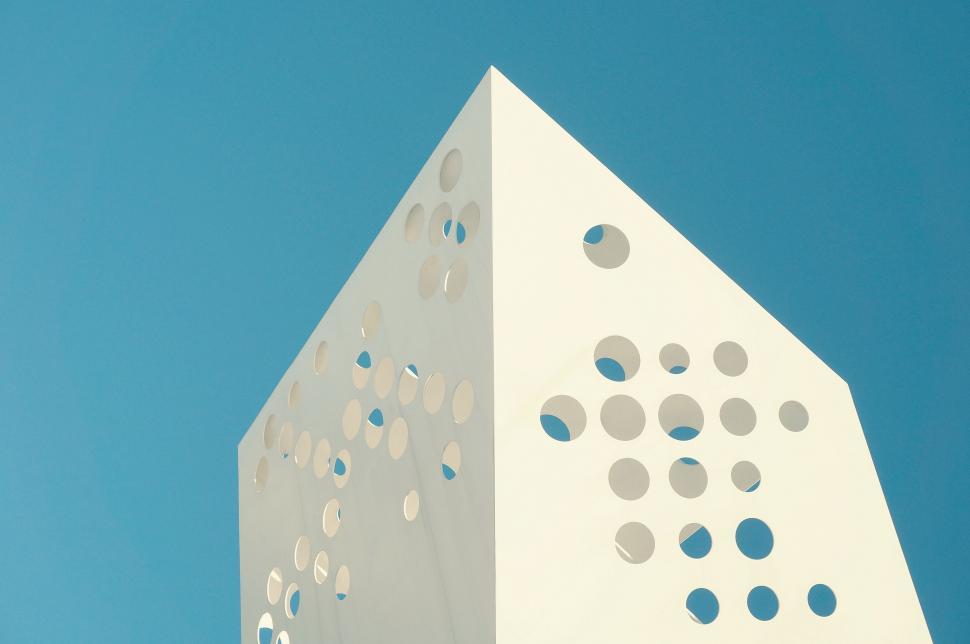 Free Image of Triangle white structure against blue sky 
