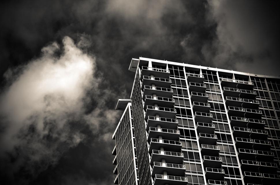 Free Image of Dramatic black and white high-rise building 