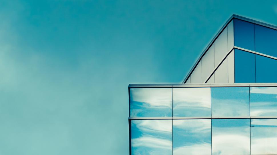 Free Image of Modern building with reflective glass facade 