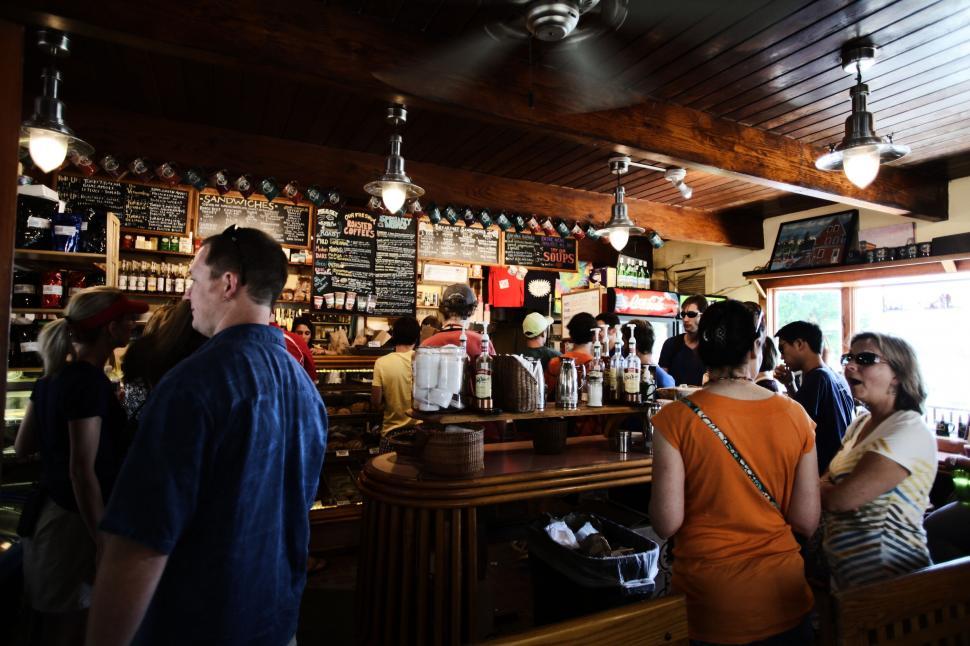 Free Image of Crowded bar interior with patrons 