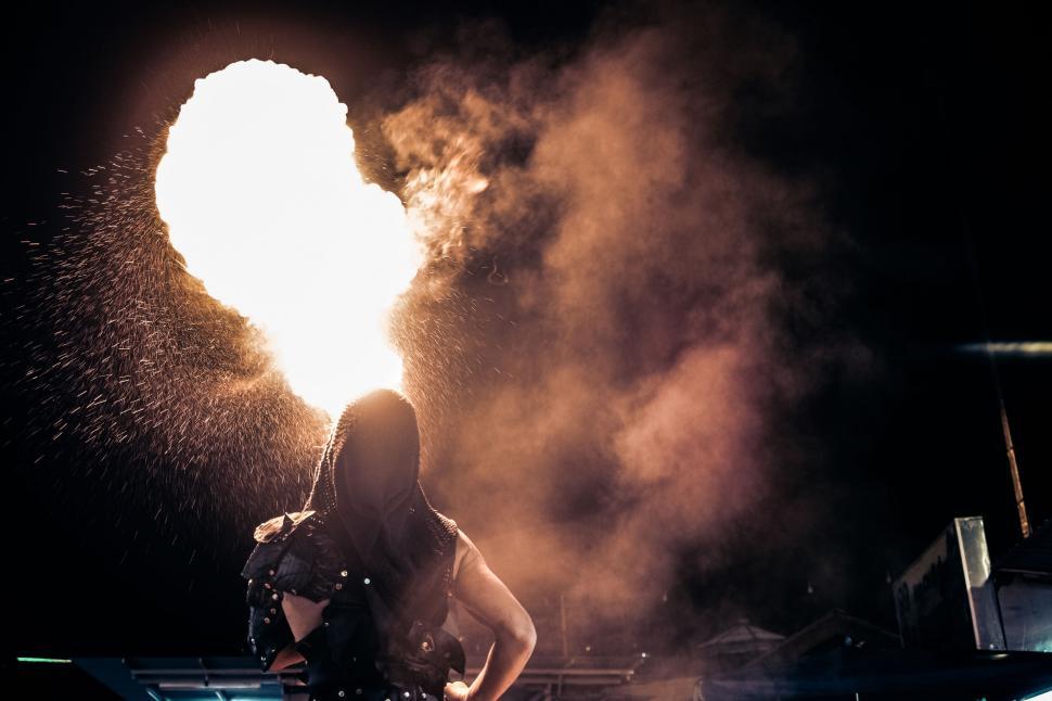 Free Image of Fire-eating performer with intense flame 