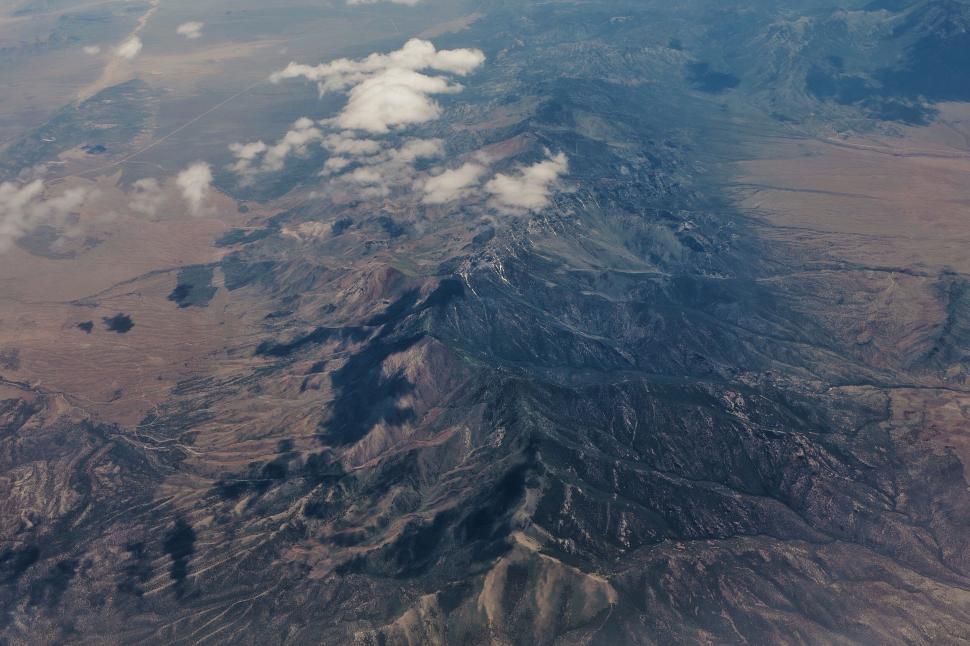 Free Image of Aerial view of dramatic mountain terrain 