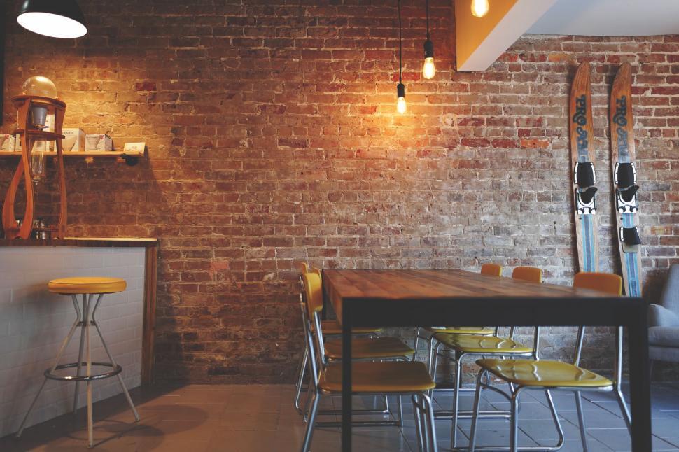 Free Image of Stylish interior with exposed brick wall 