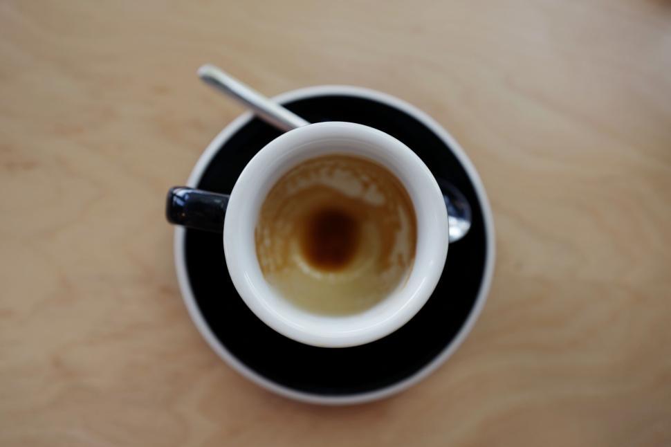 Free Image of Empty coffee cup from above on table 