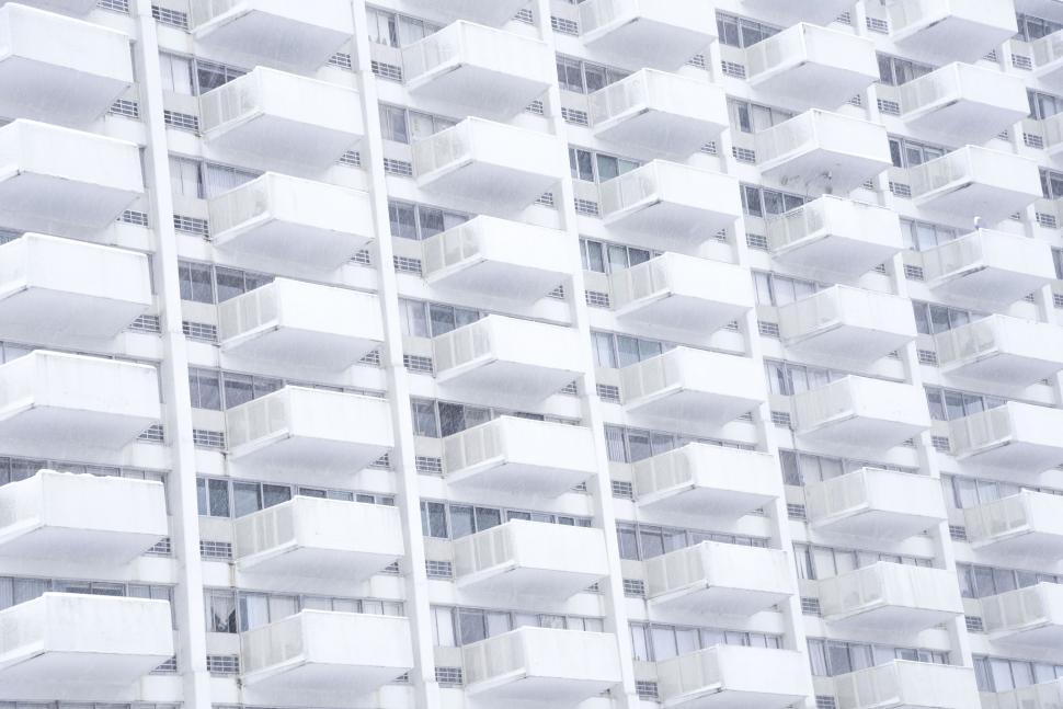 Free Image of Geometric pattern of a white apartment building 