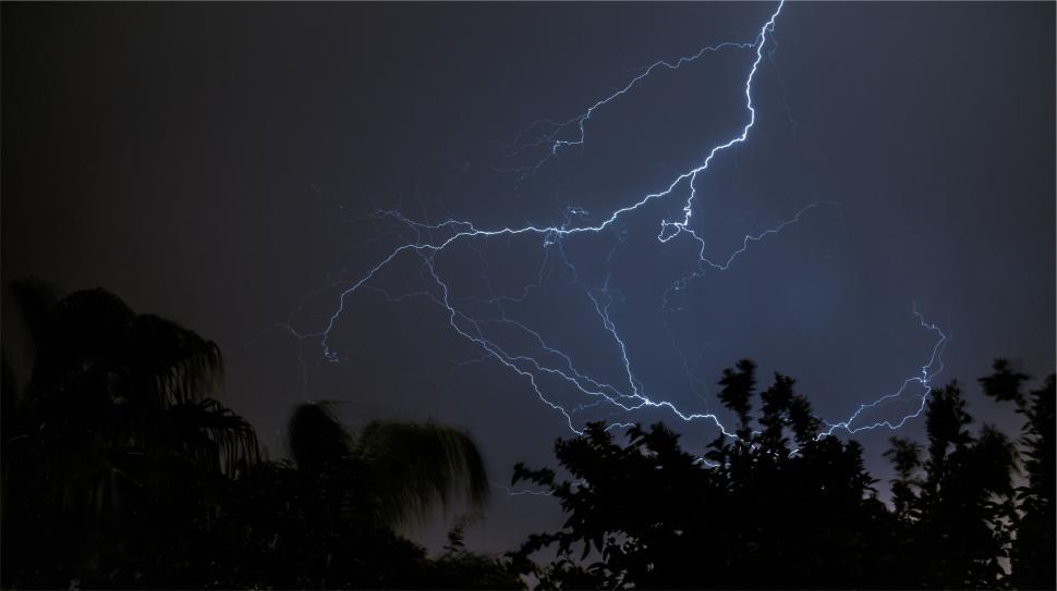 Free Image of Dramatic lightning strike in night sky 