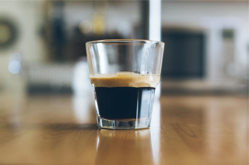 Free Image of Espresso shot in a clear glass on table 