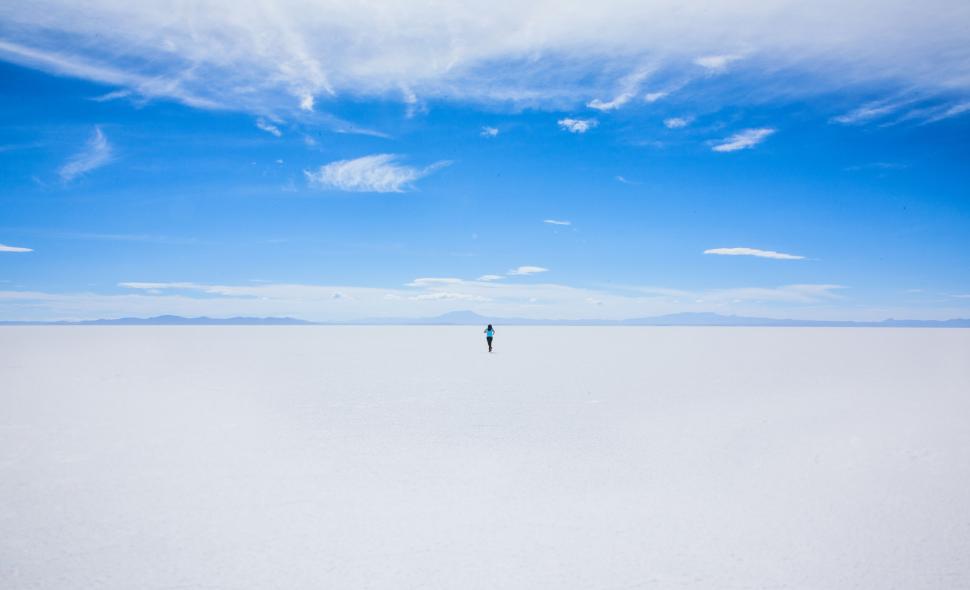 Free Image of Lone person in vast white salt flat 