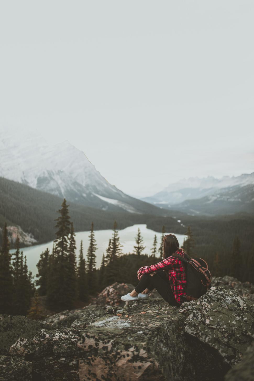 Free Image of Person enjoying mountain and lake view 