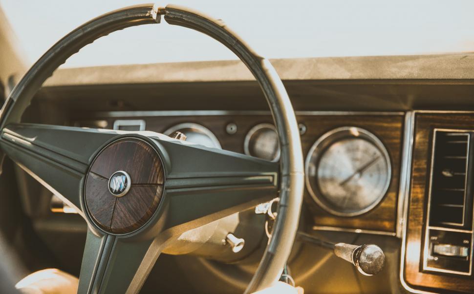 Free Image of Vintage car dashboard and steering wheel 
