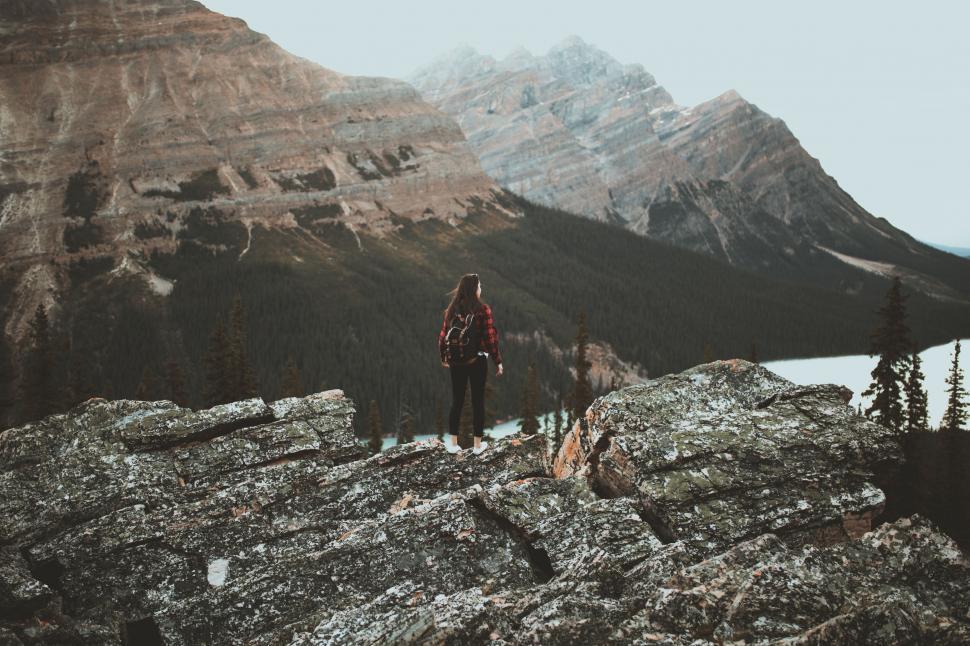 Free Image of Adventurous person overlooking a mountain range 