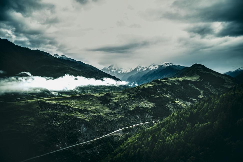 Free Image of Moody mountain landscape with clouds 