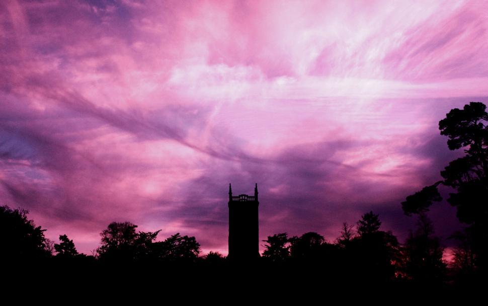 Free Image of Vivid Pink Sky at Twilight with Silhouette Tower 