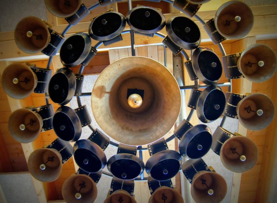 Free Image of Ceiling filled with vintage cone speakers 