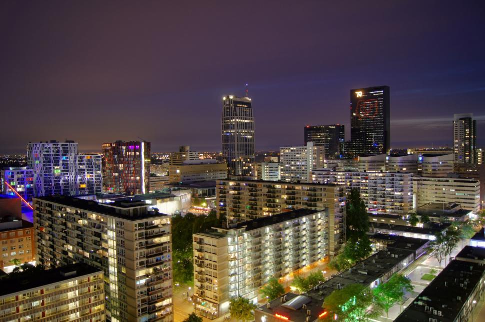 Free Image of Cityscape night view with illuminated buildings 