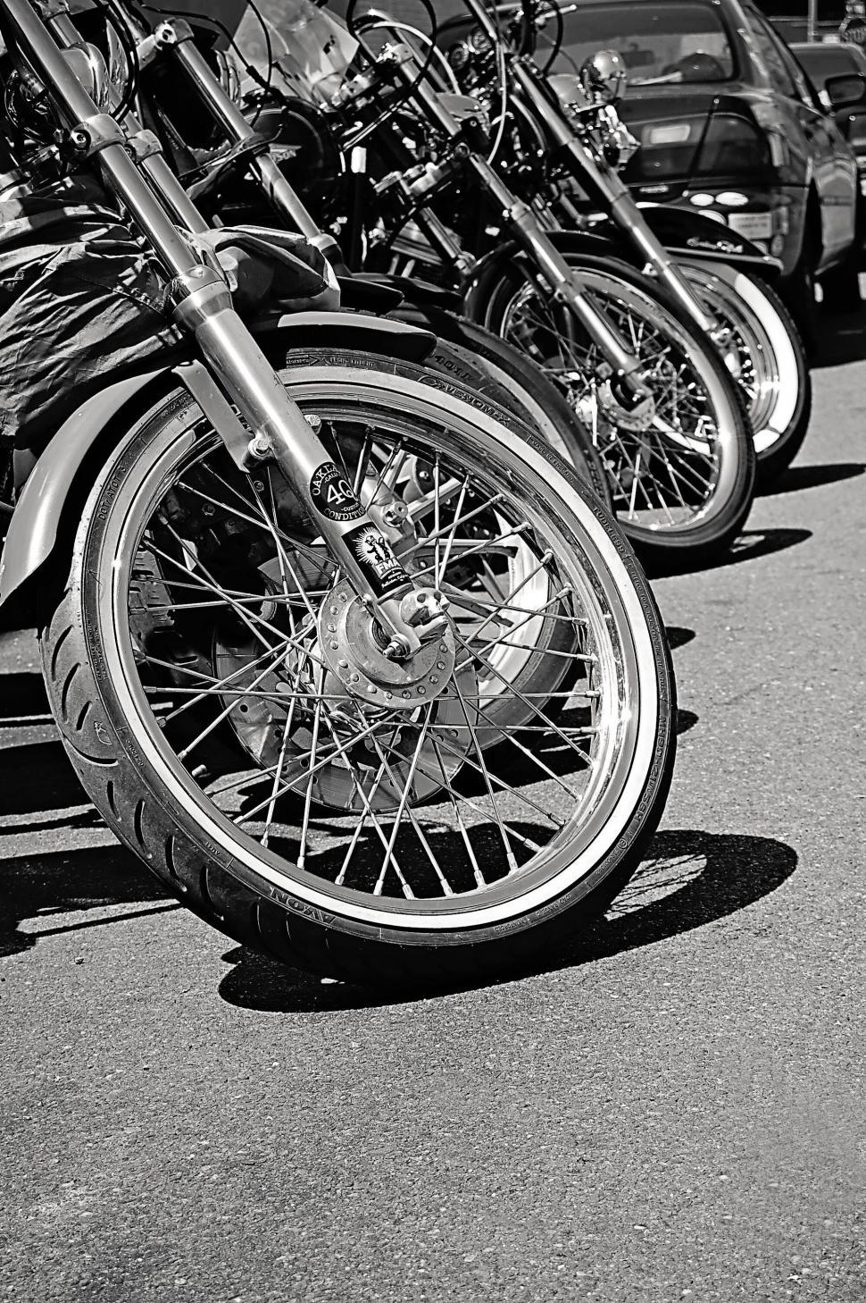 Free Image of Motorcycle wheels in black and white 