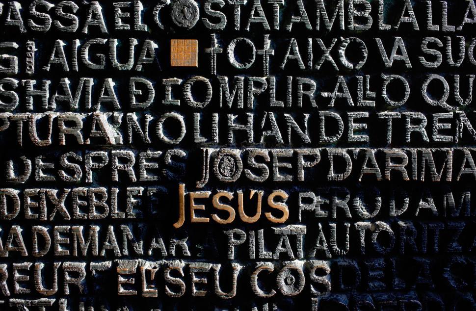 Free Image of Inscribed religious words on stone surface 
