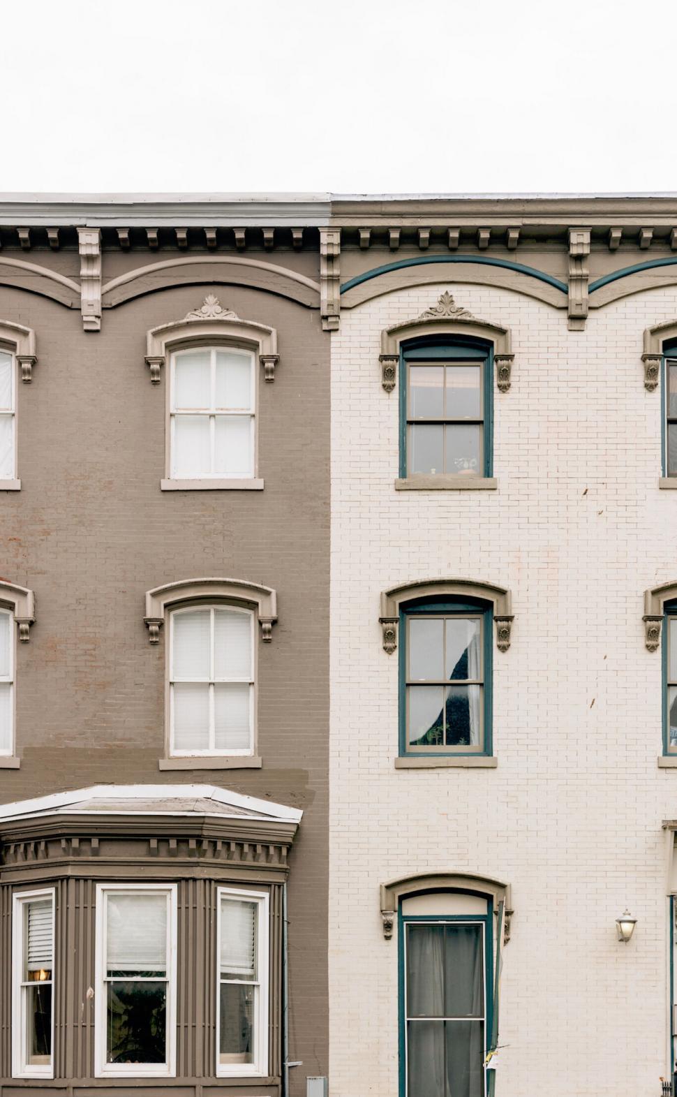 Free Image of Victorian style buildings with ornate windows 