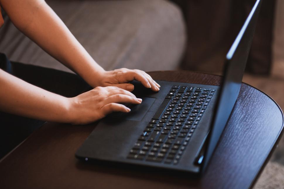 Free Image of Person typing on a laptop computer 